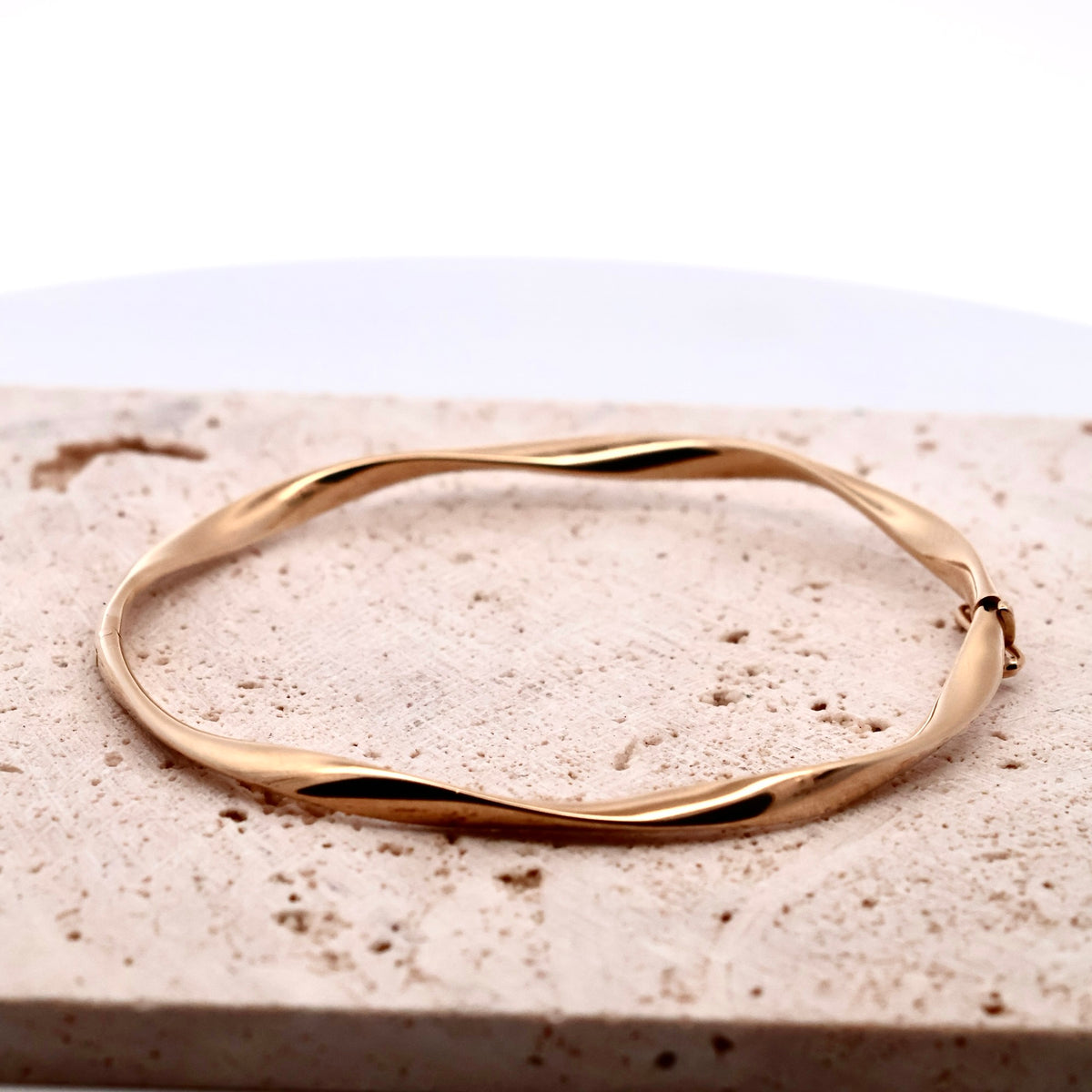 9CT YELLOW GOLD TWIST BANGLE