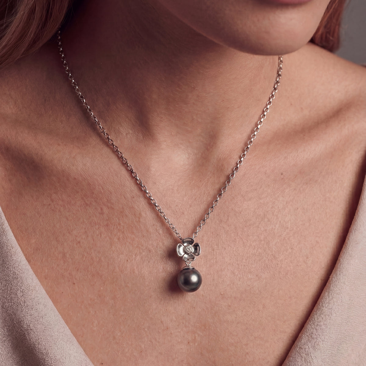 HANDCRAFTED 18CT WHITE GOLD FLOWER TAHITIAN PEARL AND DIAMOND PENDANT