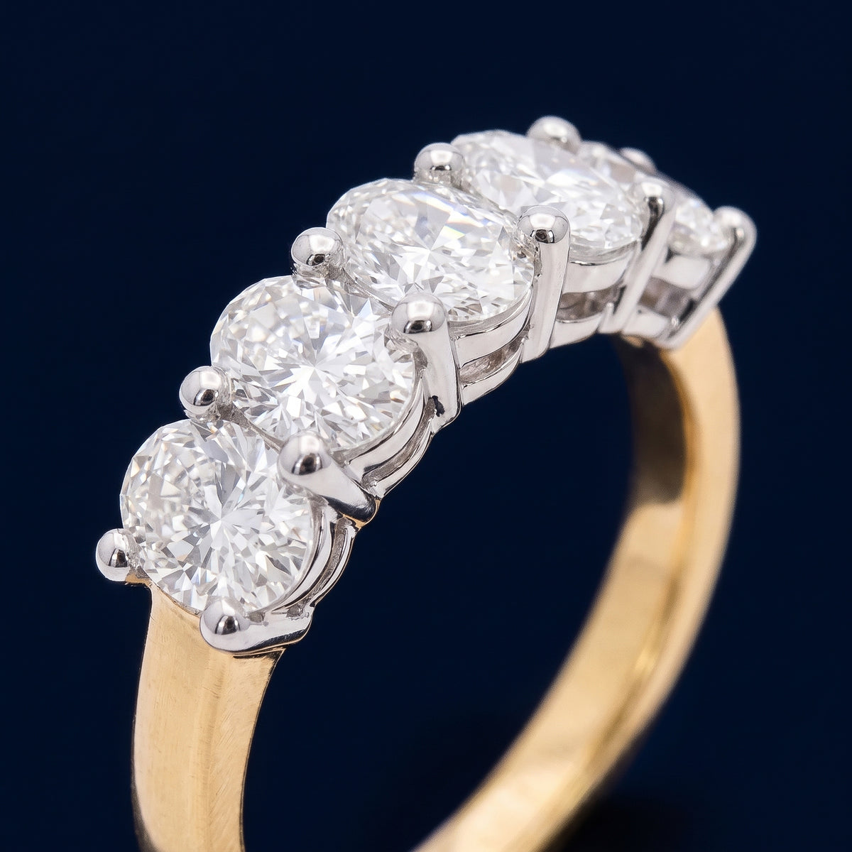 CRAFTED 18CT YELLOW GOLD AND PLATINUM DIAMOND RING
