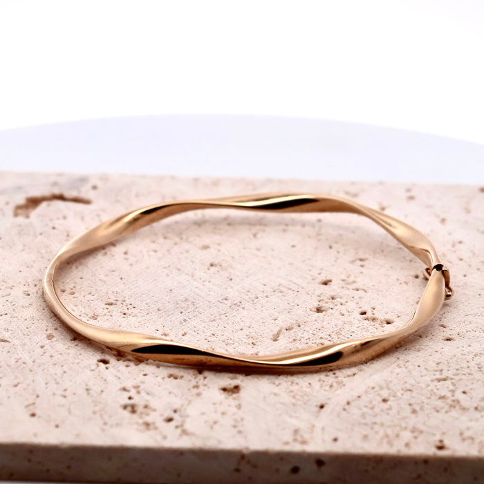 9CT YELLOW GOLD TWIST BANGLE