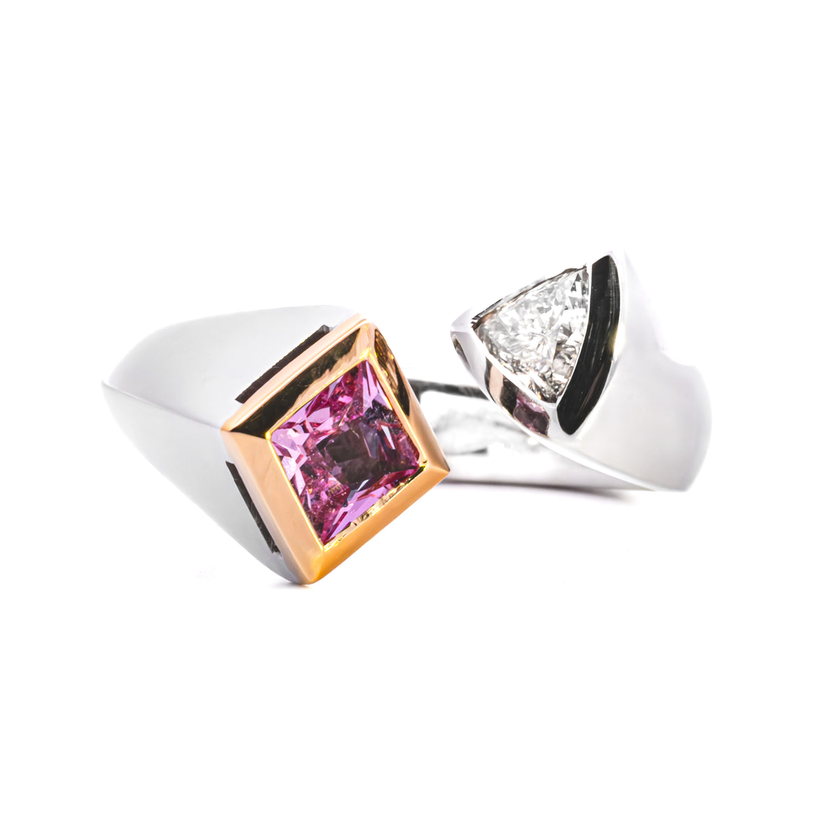 White gold crossover ring with a square pink gemstone and a trilliant-cut diamond, NY2K Jewellers, Maroochydore