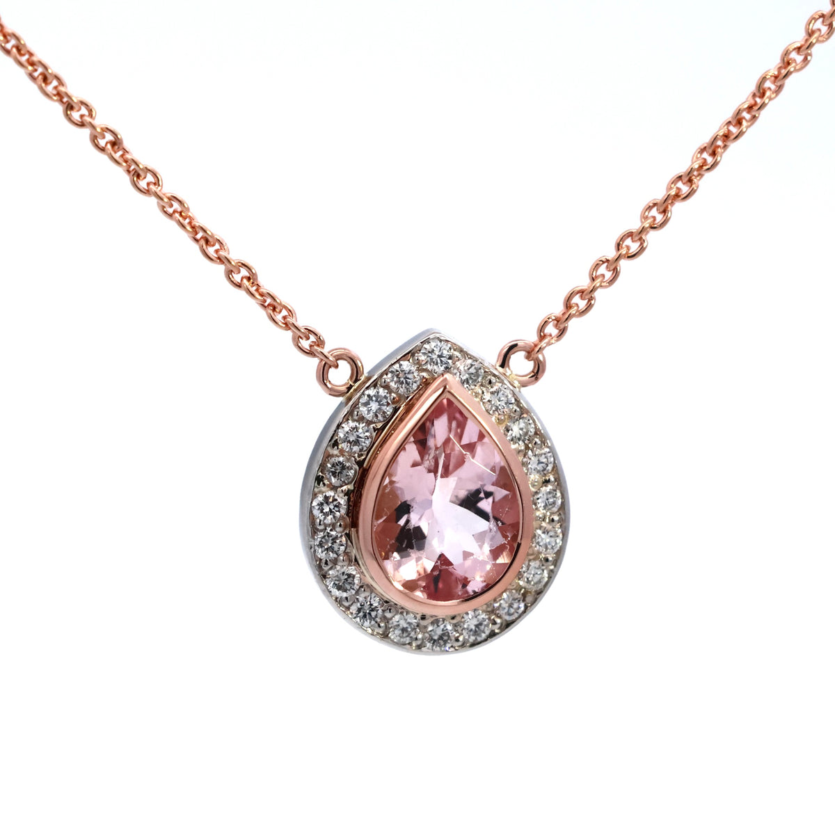 Pear-cut pink gemstone pendant with a diamond halo on a rose gold chain, NY2K Jewellers, Maroochydore