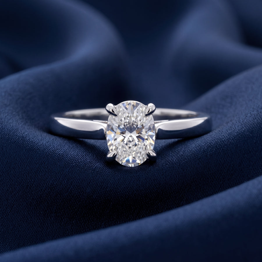 DIAMOND SOLITAIRE RING - 0.90CT