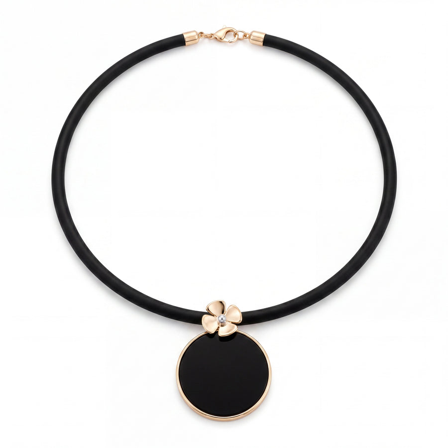 9CT YELLOW GOLD ONYX FLOWER PENDANT