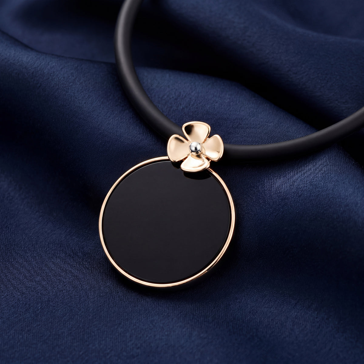 HANDCRAFTED 9CT YELLOW GOLD ONYX FLOWER PENDANT
