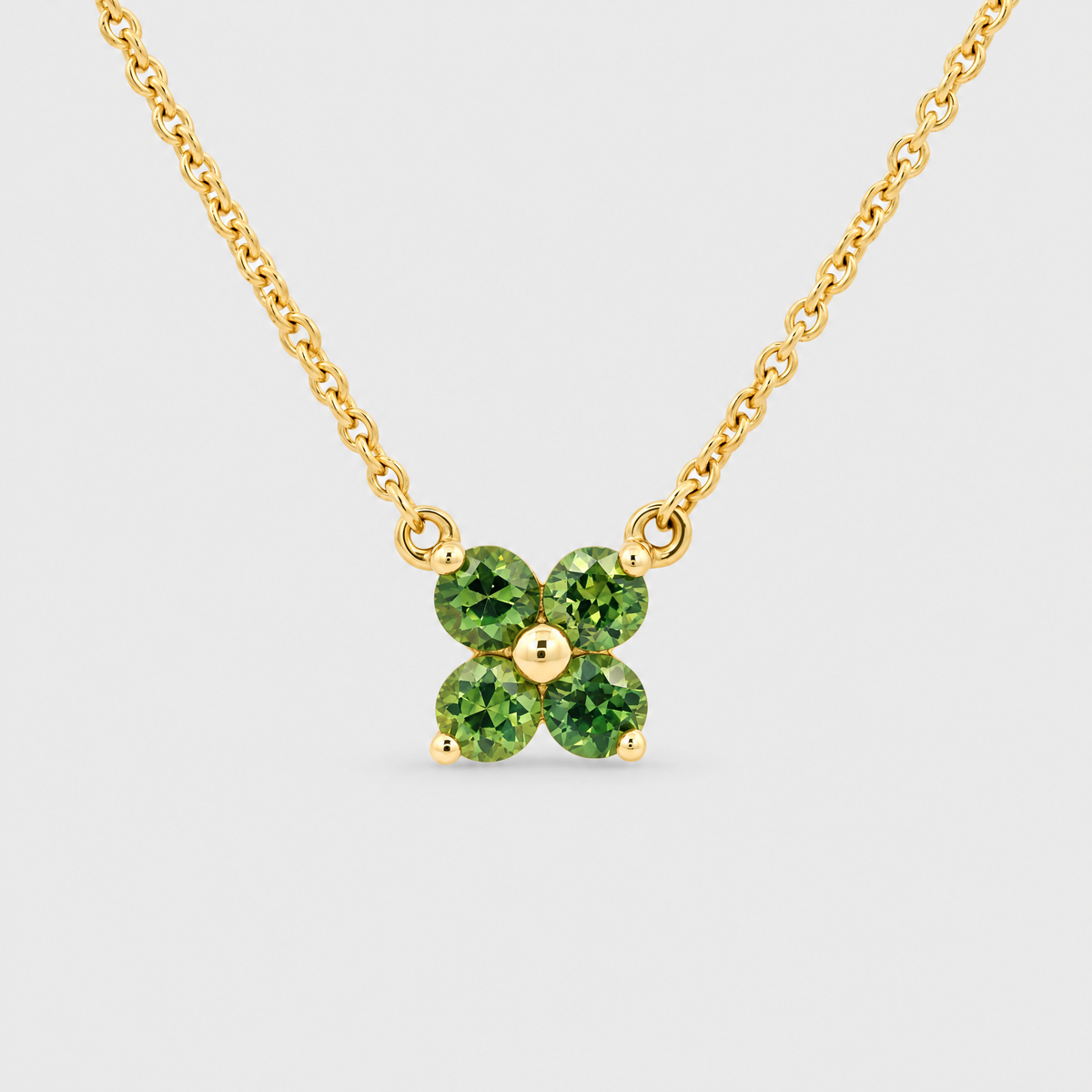 9ct Yellow Gold Green Sapphire Flower Pendant, front view